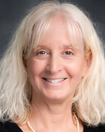An image of Brenda smiling